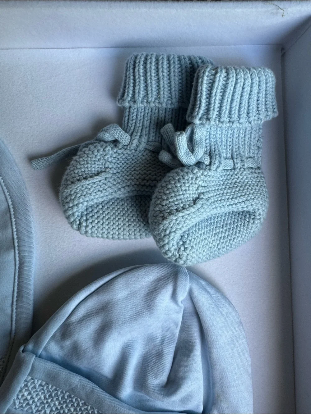 Kissy Kissy newborn bundle hat, bibs, booties